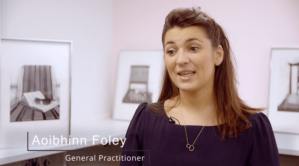 A screenshot of a video where a woman is speaking to the camera, the caption on the video reads 'Aoibhinn Foley, General Practitioner'